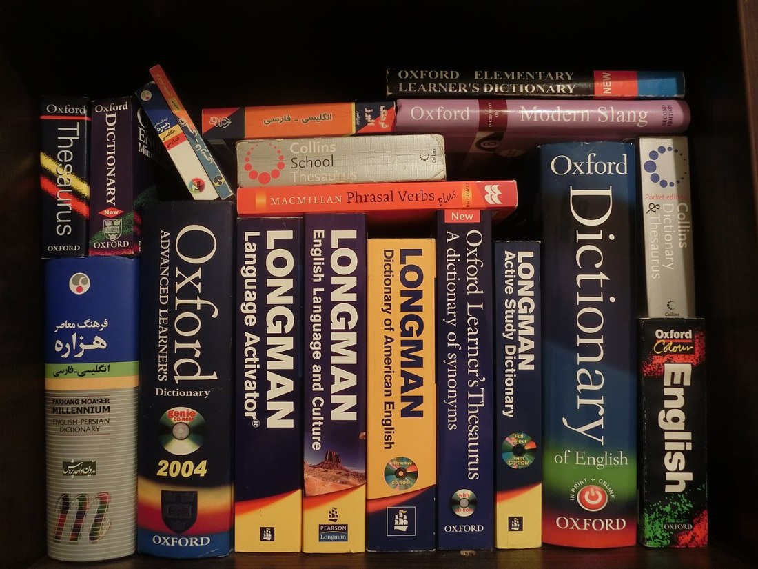 Dictionaries on a shelf